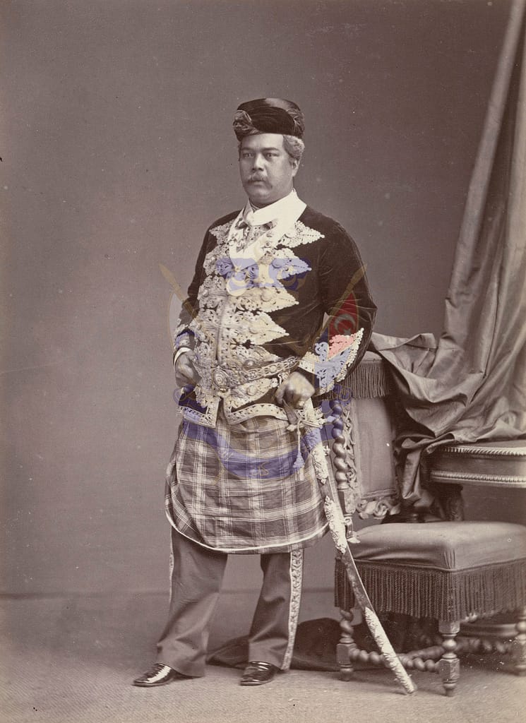 Sultan Abu Bakar mengenakan kain samping tartan